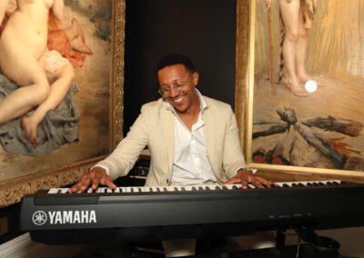 Live piano performance inside MS Rau Gallery during the Art of Whiskey event